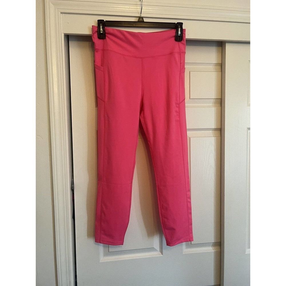 Hot pink Bebe Sport Leggings Size large women’s. Mid calf length, Pockets